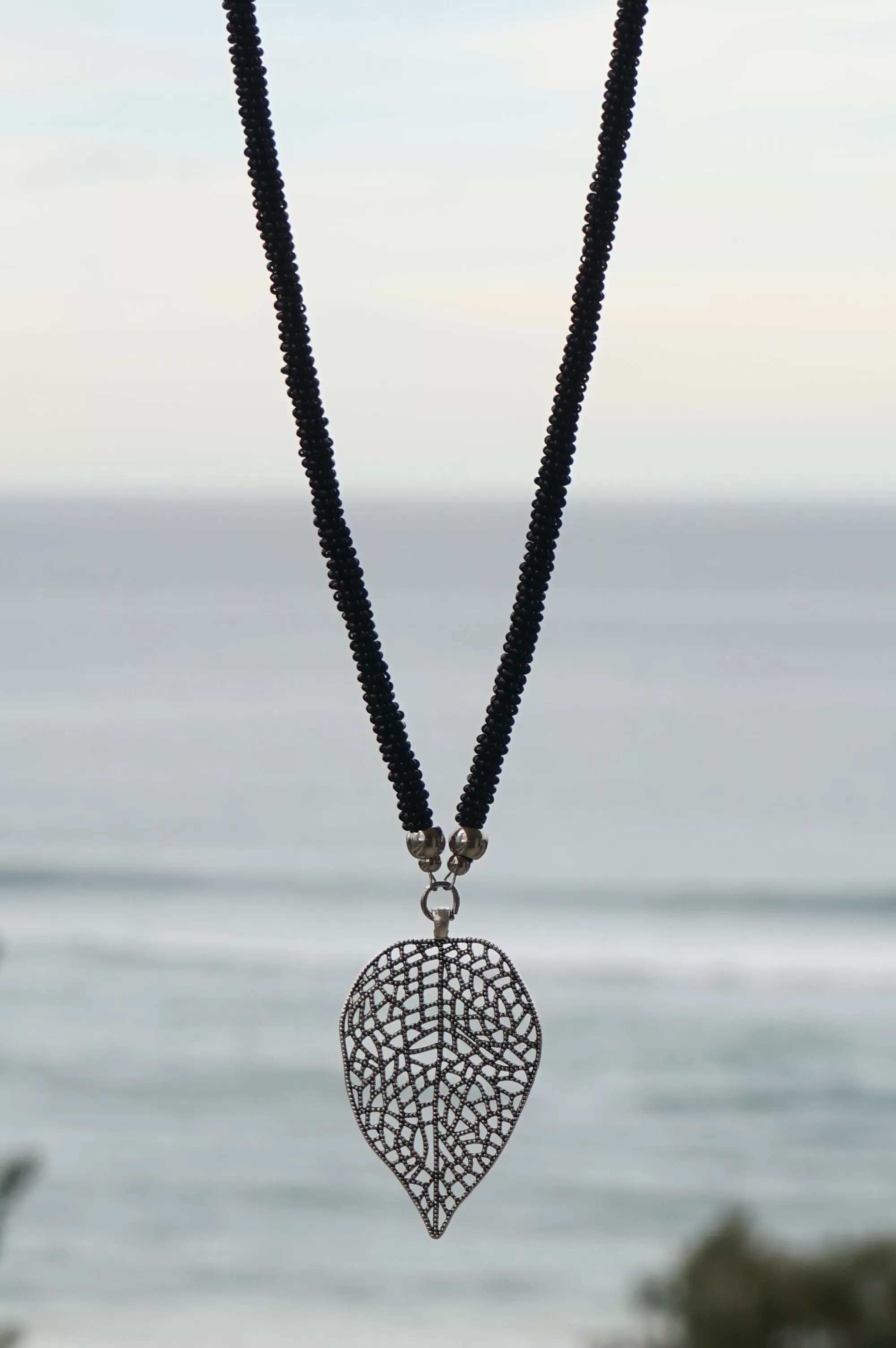 Black Beaded Leaf Pendant Necklace