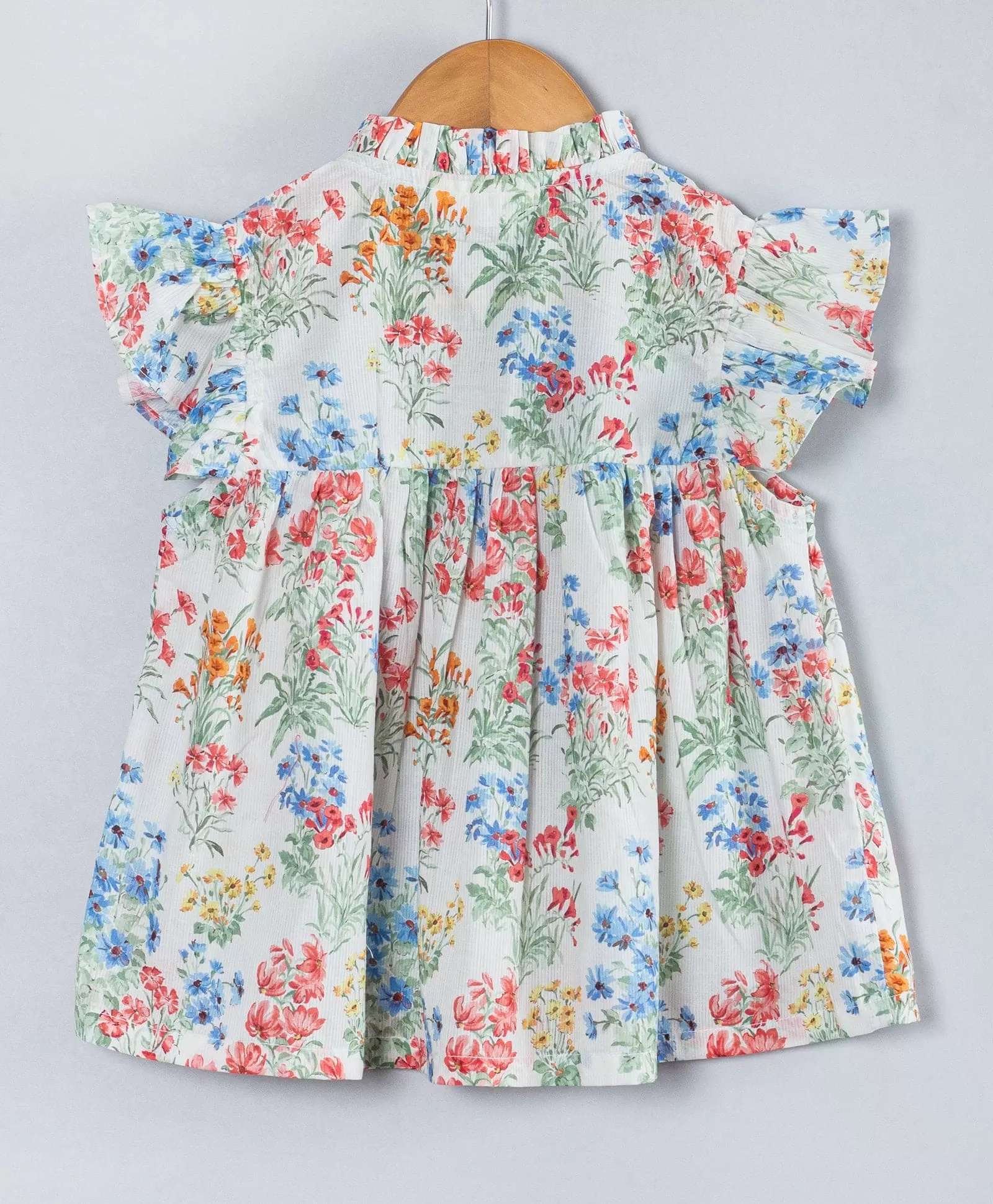 Flower bunch print top with frills at neck n armhole-White