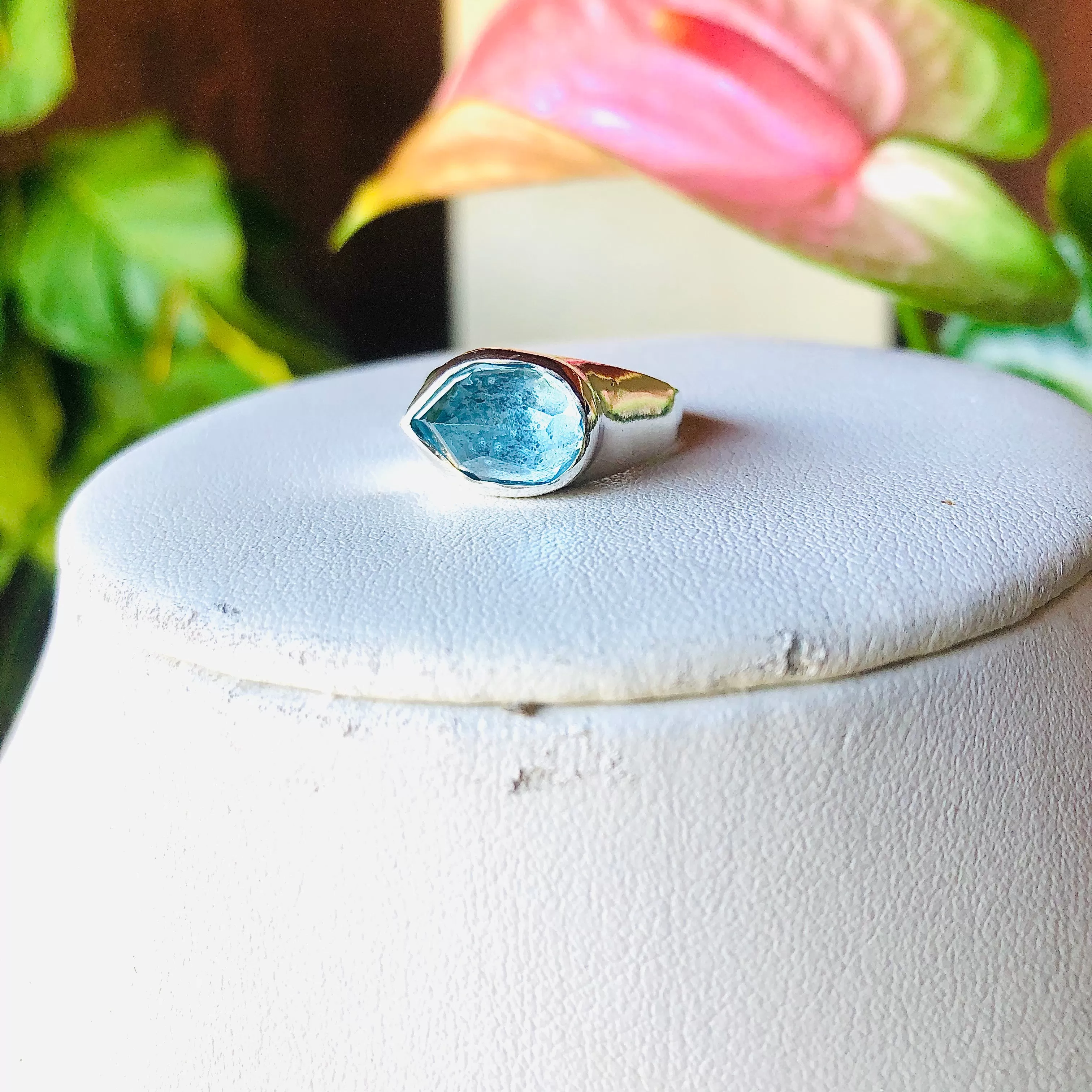 Large pear top blue topaz ring