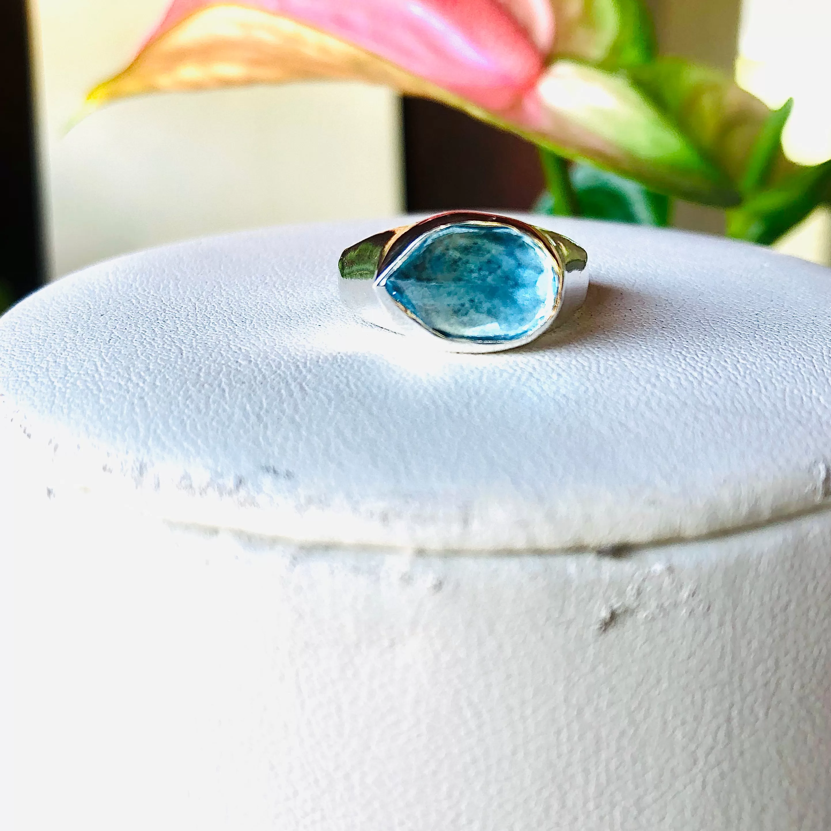 Large pear top blue topaz ring